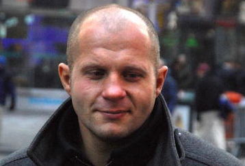 NEW YORK - JANUARY 20:  Fedor Vladimirovich Emelianenko, heavyweight mixed martial artist and current World Alliance of Mixed Martial Arts heavyweight champion rings the NASDAQ opening bell at NASDAQ in Times Square on January 20, 2009 in New York City.  (Photo by Joe Corrigan/Getty Images)