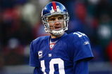 EAST RUTHERFORD, NJ -  JANUARY 11:  Eli Manning #10 of the New York Giants looks on against the Philadelphia Eagles during the NFC Divisional Playoff Game on January 11, 2009 at Giants Stadium in East Rutherford, New Jersey.  The Eagles defeated the Giants 23 -11. (Photo by Chris McGrath/Getty Images)