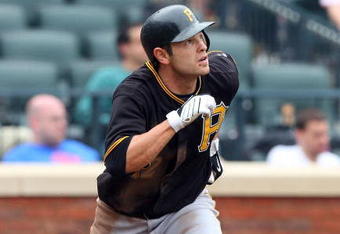 NEW YORK - MAY 09:  Freddy Sanchez #12 of the Pittsburgh Pirates runs against the New York Mets on May 9, 2009 at Citi Field in the Flushing neighborhood of the Queens borough of New York City. The Mets defeated the Pirates 10-1.  (Photo by Jim McIsaac/Getty Images)