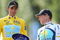 PARIS - JULY 26:  Yellow Jersey holder and race winner Alberto Contador (L) of Spain and Astana holds  the trophy as Lance Armstrong of the USA and Astana looks on after Stage Twenty One of the Tour de France on July 26, 2009 in Paris, France.  (Photo by Bryn Lennon/Getty Images)
