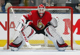 TORONTO - APRIL 11:  Brian Elliott #30 of the Ottawa Senators watches for an incoming shot in a game against the Toronto Maple Leafs on April 11, 2009 at the Air Canada Centre in Toronto, Ontario. The Leafs defeated the Senators on the strength of a 3 goal performance by Boyd Devereaux #22. (Photo by Claus Andersen/Getty Images) 