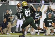 TAMPA, FL - OCTOBER 2: Wide receiver Jessie Hester #87 of the University of South Florida Bulls grabs a fourth-quarter touchdown pass against the Pittsburgh Panthers at Raymond James Stadium on October 2, 2008 in Tampa, Florida.  (Photo by Al Messerschmidt/Getty Images)