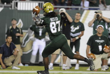 TAMPA, FL - OCTOBER 2: Wide receiver Jessie Hester #87 of the University of South Florida Bulls grabs a fourth-quarter touchdown pass against the Pittsburgh Panthers at Raymond James Stadium on October 2, 2008 in Tampa, Florida.  (Photo by Al Messerschmidt/Getty Images)