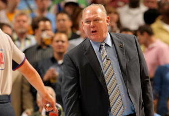 DENVER - APRIL 22:  Head coach George Karl of the Denver Nuggets has words with the officials as he leads his team against the New Orleans Hornets in Game Two of the Western Conference Quarterfinals during the 2009 NBA Playoffs at Pepsi Center on April 22, 2009 in Denver, Colorado. The Nuggets defeated the Hornets 108-93. NOTE TO USER: User expressly acknowledges and agrees that, by downloading and or using this photograph, User is consenting to the terms and conditions of the Getty Images License Agreement.  (Photo by Doug Pensinger/Getty Images)