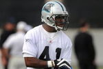 CHARLOTTE,NC- MAY 1: Seventh round draft pick Captain Munnerlyn #41 of the Carolina Panthers grabs a pad as minicamp practice gets set to begin  at the team's practice facility on May 1, 2009 in Charlotte, North Carolina. (Photo by Steve Dykes/Getty Images)