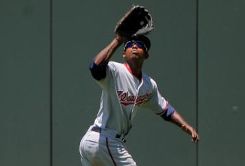 DENVER - JULY 08:  Centerfielder Nyjer Morgan #1 of the Washington Nationals tracks down a fly ball against the Colorado Rockies during MLB action at Coors Field on July 8, 2009 in Denver, Colorado. The Rockies defeated the Nationals 10-4.  (Photo by Doug Pensinger/Getty Images)