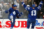 TORONTO - FEBRUARY 9:  Nik Antropov #80 of the Toronto Maple Leafs celebrates his game winning overtime goal against the Detroit Red Wings with teammate Mats Sundin #13 during their NHL game at the Air Canada Centre February 9, 2008 in Toronto, Ontario.  (Photo by Dave Sandford/Getty Images)