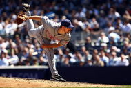 NEW YORK - APRIL 16:  Cliff Lee #31 of the Cleveland Indians pitches against the New York Yankees during opening day at the new Yankee Stadium on April 16, 2009 in the Bronx borough of New York City. This is the first regular season MLB game being played at the new venue which replaced the old Yankee Stadium as the Yankees home field.  (Photo by Chris McGrath/Getty Images)