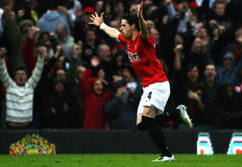 MANCHESTER, UNITED KINGDOM - APRIL 13:  Owen Hargreaves of Manchester United celebrates scoring his teams 2nd goal during the Barclays Premier League match between Manchester United and Arsenal at Old Trafford on April 13, 2008 in Manchester, England.  (Photo by Clive Brunskill/Getty Images)