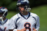 ENGLEWOOD, CO - JUNE 12:  Quarterback Kyle Orton #8 of the Denver Broncos warms up during minicamp practice at the Broncos Dove Valley training facility on June 12, 2009 in Englewood, Colorado.  (Photo by Doug Pensinger/Getty Images)