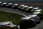 LONG POND, PA - JUNE 08:  The field makes its way through turn number two, the tunnel turn, during the NASCAR Sprint Cup Series Pocono 500 on June 8, 2008 at Pocono International Raceway in Long Pond, Pennsylvania.  (Photo by Doug Pensinger/Getty Images for NASCAR)