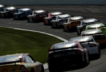 LONG POND, PA - JUNE 08:  The field makes its way through turn number two, the tunnel turn, during the NASCAR Sprint Cup Series Pocono 500 on June 8, 2008 at Pocono International Raceway in Long Pond, Pennsylvania.  (Photo by Doug Pensinger/Getty Images for NASCAR)