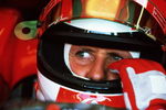 MAGNY-COURS - JULY 21:  Five times Formula One Champion Ferrari driver Michael Schmacher of Germany in the garage relaxing before the Formula One French Grand Prix at Nevers Magny-Cours Circuit, France. (Photo by: Clive Mason/Getty Images.)