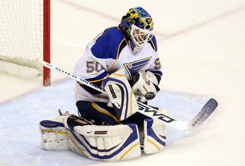 GLENDALE, AZ - APRIL 07:  Goaltender Chris Mason #50 of the St. Louis Blues makes a glove save on a shot from the Phoenix Coyotes during the NHL game at Jobing.com Arena on April 7, 2009 in Glendale, Arizona.  (Photo by Christian Petersen/Getty Images)