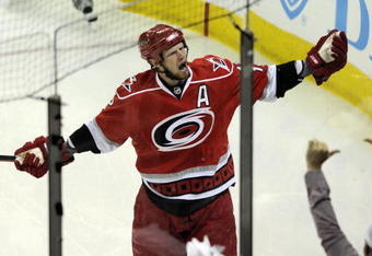 RALEIGH, NC - MAY 26:  Eric Staal #12 of the Carolina Hurricanes celebrates his first period goal against the Pittsburgh Penguins during Game Four of the Eastern Conference Championship Round of the 2009 Stanley Cup Playoffs at RBC Center on May 26, 2009 in Raleigh, North Carolina.  The Penguins defeated the Hurricanes 4-1 to clinch the NHL's Eastern Conference title.(Photo by Grant Halverson/Getty Images)