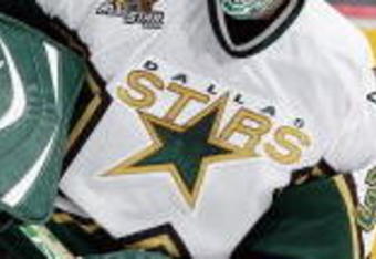 VANCOUVER, CANADA - APRIL 19:  Goaltender Marty Turco #35 of the Dallas Stars skates to the middle slot to play the puck against the Vancouver Canucks during their NHL playoff game at General Motors Place on April 19, 2007 in Vancouver, British Columbia, Canada.  The Stars defeated the Canucks 1-0 in overtime. (Jeff Vinnick/Getty Images)