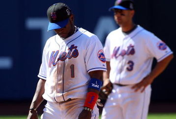 NEW YORK - JULY 12:  Luis Castillo #1 and Alex Cora #3 of the New York Mets look on against the Cincinnati Reds on July 12, 2009 at Citi Field in the Flushing neighborhood of the Queens borough of New York City.  (Photo by Jim McIsaac/Getty Images)