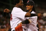 BOSTON - JULY 27: David Ortiz #34 and Manny Ramirez #24 of the Boston Red Sox embrace during a game with the New York Yankees at Fenway Park on July 27, 2008 in Boston, Massachusetts.  (Photo by Jim Rogash/Getty Images)