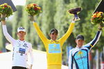 PARIS - JULY 26:  Race winner Alberto Contador of Spain and Astana celebrates with second place Alex Schleck (L) of Luxembourg and Saxo Bank and third place Lance Armstrong (R) of USA and Astana on the podium after Stage Twenty One of the Tour de France on July 26, 2009 in Paris, France.  (Photo by Bryn Lennon/Getty Images)