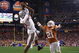 GLENDALE, AZ - JANUARY 05: Terrelle Pryor #2 of the Ohio State Buckeyes makes a leaping 5 yard touchdown reception over Blake Gideon #21 of the Texas Longhorns during the fourth quarter of the Tostitos Fiesta Bowl Game on January 5, 2009 at University of Phoenix Stadium in Glendale, Arizona. (Photo by Jed Jacobsohn/Getty Images)
