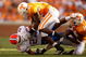 KNOXVILLE, TN - SEPTEMBER 20:  Emmanuel Moody #21 of the Florida Gators is tackled by teammates DeAngelo Willingham #24 and Eric Berry #14 of the Tennessee Volunteers during their game at Neyland Stadium on September 20, 2008 in Knoxville, Tennessee.  (Photo by Streeter Lecka/Getty Images)