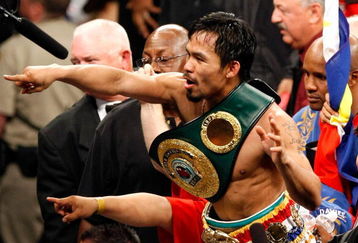 LAS VEGAS - MAY 02:  Manny Pacquiao of the Philippines celebrates after knocking out Ricky Hatton of England in the second round of their junior welterweight title fight at the MGM Grand Garden Arena May 2, 2009 in Las Vegas, Nevada.  (Photo by Ethan Miller/Getty Images)
