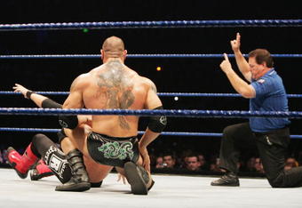 SYDNEY, AUSTRALIA - JUNE 15:  The referee signals a two count after Batista tried to pin World Heavyweight Champion Edge during WWE Smackdown at Acer Arena on June 15, 2008 in Sydney, Australia.  (Photo by Gaye Gerard/Getty Images)