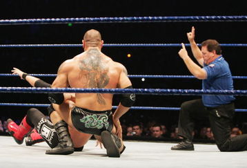 SYDNEY, AUSTRALIA - JUNE 15:  The referee signals a two count after Batista tried to pin World Heavyweight Champion Edge during WWE Smackdown at Acer Arena on June 15, 2008 in Sydney, Australia.  (Photo by Gaye Gerard/Getty Images)