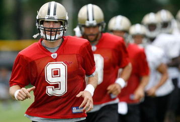 JACKSON, MS - JULY 31: New Orleans Saints quarterback Drew Brees #9 practices while attending New Orleans Saints Training Camp at Millsaps College July 31, 2008 in Jackson, Mississippi. (Photo by Sean Gardner/Getty Images)