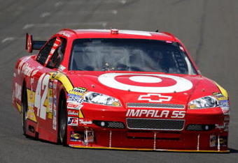 INDIANAPOLIS - JULY 26:  Juan Pablo Montoya, driver of the #42 Target Chevrolet, leads a pack of cars, during the NASCAR Sprint Cup Series Allstate 400 at the Brickyard at Indianapolis Motor Speedway on July 26, 2009 in Indianapolis, Indiana.  (Photo by Jamie Squire/Getty Images)