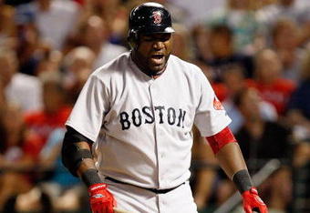 ARLINGTON, TX - JULY 22:  Designated hitter David Ortiz #34 of the Boston Red Sox reacts after hitting a foul ball against the Texas Rangers on July 22, 2009 at Rangers Ballpark in Arlington, Texas.  (Photo by Ronald Martinez/Getty Images)