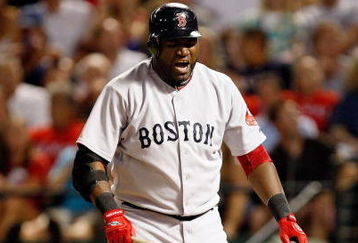 ARLINGTON, TX - JULY 22:  Designated hitter David Ortiz #34 of the Boston Red Sox reacts after hitting a foul ball against the Texas Rangers on July 22, 2009 at Rangers Ballpark in Arlington, Texas.  (Photo by Ronald Martinez/Getty Images)