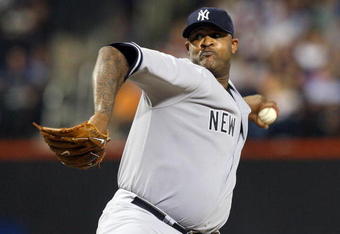 NEW YORK - JUNE 26:  CC Sabathia #52 of the New York Yankees pitches against the New York Mets on June 26, 2009 at Citi Field in the Flushing neighborhood of the Queens borough of New York City.  (Photo by Jim McIsaac/Getty Images)