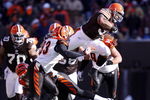 CLEVELAND - DECEMBER 21: Jamal Lewis #31 of the Cleveland Browns jumps over Chinedum Ndukwe #41 of the Cincinnati Bengals for a first quarter first down at Cleveland Browns Stadium December 21, 2008 in Cleveland, Ohio.  (Photo by Gregory Shamus/Getty Images)