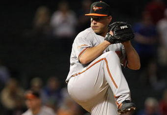 ARLINGTON, TX - APRIL 13:  Closer  George Sherrill #52 of the Baltimore Orioles throws against the Texas Rangers in the 9th inning on April 13, 2009 at Rangers Ballpark in Arlington, Texas.  (Photo by Ronald Martinez/Getty Images)