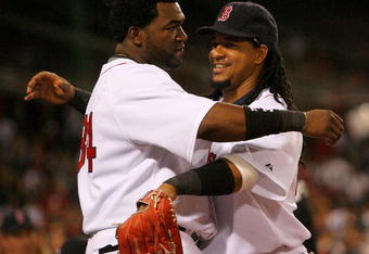 BOSTON - JULY 27: David Ortiz #34 and Manny Ramirez #24 of the Boston Red Sox embrace during a game with the New York Yankees at Fenway Park on July 27, 2008 in Boston, Massachusetts.  (Photo by Jim Rogash/Getty Images)