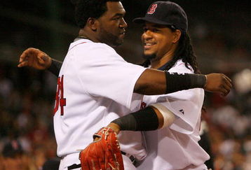 BOSTON - JULY 27: David Ortiz #34 and Manny Ramirez #24 of the Boston Red Sox embrace during a game with the New York Yankees at Fenway Park on July 27, 2008 in Boston, Massachusetts.  (Photo by Jim Rogash/Getty Images)