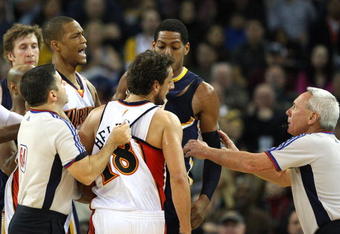 OAKLAND, CA - JANUARY 11: Danny Granger #33 of the Indiana Pacers argues with Marco Belinelli #18 and Anthony Randolph #4 of the Golden State Warriors during an NBA game on January 11, 2009 at Oracle Arena in Oakland, California. Granger and Belinelli were called for technical fous. NOTE TO USER: User expressly acknowledges and agrees that, by downloading and or using this photograph, User is consenting to the terms and conditions of the Getty Images License Agreement. (Photo by Jed Jacobsohn/Getty Images)