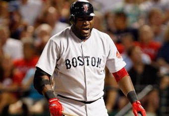 ARLINGTON, TX - JULY 22:  Designated hitter David Ortiz #34 of the Boston Red Sox reacts after hitting a foul ball against the Texas Rangers on July 22, 2009 at Rangers Ballpark in Arlington, Texas.  (Photo by Ronald Martinez/Getty Images)