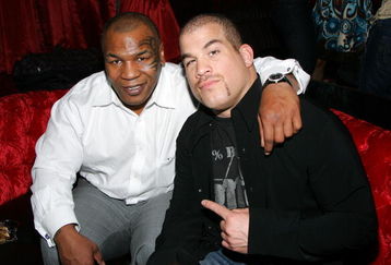 LAS VEGAS - JANUARY 26: Former boxer Mike Tyson (L) and mixed martial arts fighter Tito Ortiz appear at the CatHouse at the Luxor Resort & Casino during Ortiz' birthday party hosted by his girlfriend, former adult film actress Jenna Jameson, early January 26, 2008 in Las Vegas, Nevada. Ortiz turned 33 on January 23rd. (Photo by Ethan Miller/Getty Images)
