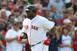 BOSTON - JULY 30:  Designated hitter David Ortiz #34 of the Boston Red Sox jogs to home plate after hitting a three-run home run against the Oakland A's in the seventh inning to give the Red Sox a 6-5 lead on July 30, 2009 at Fenway Park in Boston, Massachusetts.  (Photo by Elsa/Getty Images)