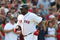 BOSTON - JULY 30:  Designated hitter David Ortiz #34 of the Boston Red Sox jogs to home plate after hitting a three-run home run against the Oakland A's in the seventh inning to give the Red Sox a 6-5 lead on July 30, 2009 at Fenway Park in Boston, Massachusetts.  (Photo by Elsa/Getty Images)