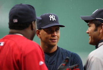 BOSTON - APRIL 11:  Alex Rodriguez (c) of the New York Yankees talks with David Ortiz (l) of the Boston Red Sox and teammate Johnny Damon (r) before the game on April 11, 2008 at Feway Park in Boston, Massachusetts. (Photo by Elsa/Getty Images)