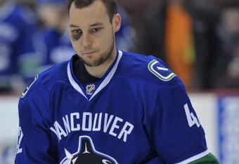 VANCOUVER, CANADA - APRIL 7: Kyle Wellwood #42 of the Vancouver Canucks skates during their game agianst the Calgary Flames at General Motors Place April 7, 2009 in Vancouver, Canada.   (Photo by Nick Didlick/Getty Images)