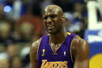 ORLANDO, FL - JUNE 11:  Lamar Odom #7 of the Los Angeles Lakers reacts in the second quarter against the Orlando Magic in Game Four of the 2009 NBA Finals on June 11, 2009 at Amway Arena in Orlando, Florida.  NOTE TO USER:  User expressly acknowledges and agrees that, by downloading and or using this photograph, User is consenting to the terms and conditions of the Getty Images License Agreement.  (Photo by Elsa/Getty Images)