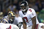 6 Jan 2002: Michael Vick #7 of the Atlanta Falcons calls out the play against the St. Louis Rams at the Dome at America's Center in St. Louis, Missouri. The St. Louis Rams beat the Atlanta Falcons 31-13.  DIGITAL IMAGE. Mandatory Credit: Elsa /Getty Images