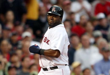 BOSTON - JULY 07:  David Ortiz #34 of the Boston Red Sox scores a run in the second inning against the Oakland Athletics on July 7, 2009 at Fenway Park in Boston, Massachusetts.  (Photo by Elsa/Getty Images)
