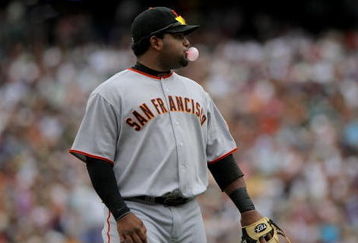 DENVER - JULY 26:  Pablo Sandoval #48 of the San Francisco Giants blows a bubble as he awaits action against the Colorado Rockies at Coors Field on July 26, 2009 in Denver, Colorado. The Rockies defeated the Giants 4-2..  (Photo by Doug Pensinger/Getty Images)