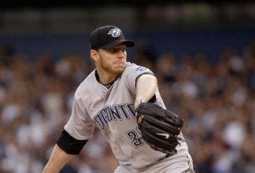 NEW YORK _ JUNE 3:  Roy Halladay #32 of the Toronto Blue Jays delivers a pitch during the game against the New York Yankees on June 3, 2008 at Yankee Stadium in the Bronx borough of New York City. (Photo by: Nick Laham/Getty Images)