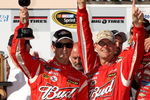 SONOMA, CA - JUNE 21: Kasey Kahne, driver of the #9 Budweiser Dodge, celebrates in victory lane with his crew chief Kenny Francis after winning the NASCAR Sprint Cup Series Toyota/Save Mart 350 at the Infineon Raceway on June 21, 2009 in Sonoma, California.  (Photo by Ezra Shaw/Getty Images for NASCAR)